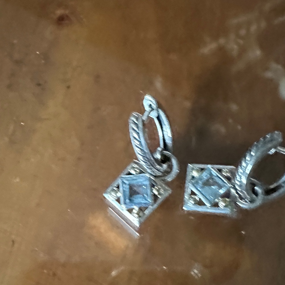 Elegant Silver and blue topaz earrings, huggie style